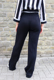 Black fabric trousers
