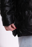 Puffer jacket with hood - black synthetic leather